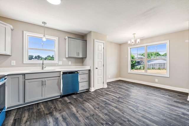 kitchen featuring dark wood-style flooring, dishwasher, gray cabinetry, and a sink