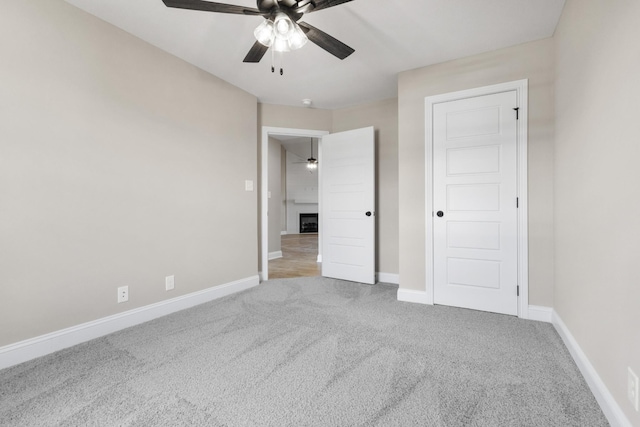 130 Anderson Pl, Clarksville, TN 37042 - unfurnished bedroom featuring baseboards, a ceiling fan, and carpet