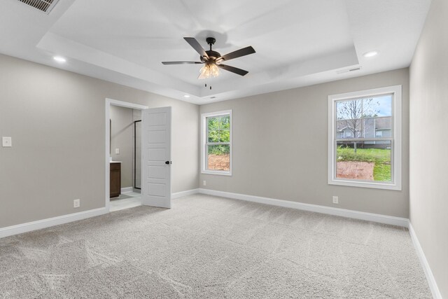 130 Anderson Pl, Clarksville, TN 37042 - unfurnished bedroom featuring a tray ceiling, carpet, baseboards, and recessed lighting