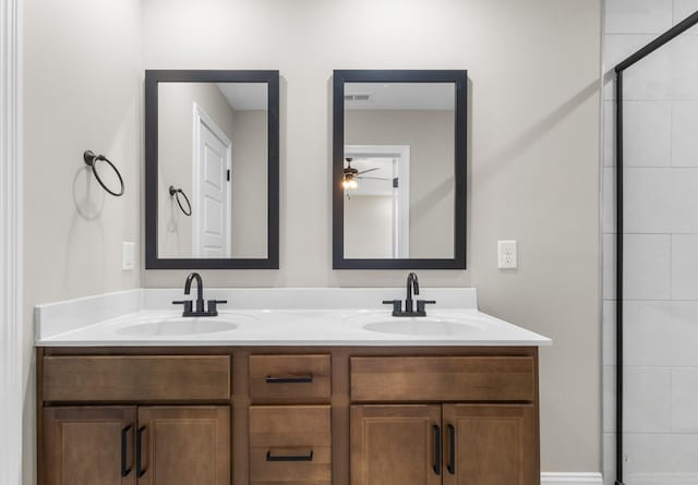 130 Anderson Pl, Clarksville, TN 37042 - full bath with ceiling fan, a tile shower, a sink, and double vanity