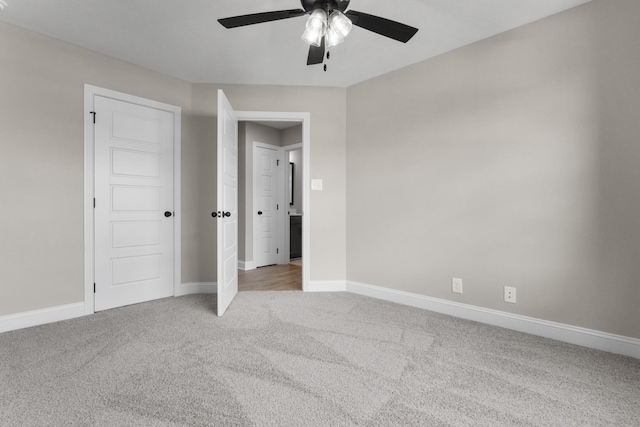 130 Anderson Pl, Clarksville, TN 37042 - unfurnished bedroom with light carpet, baseboards, and ceiling fan