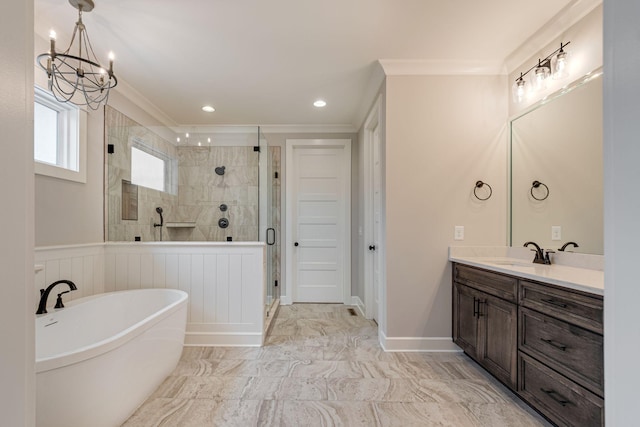 bathroom featuring plus walk in shower, vanity, ornamental molding, and a notable chandelier