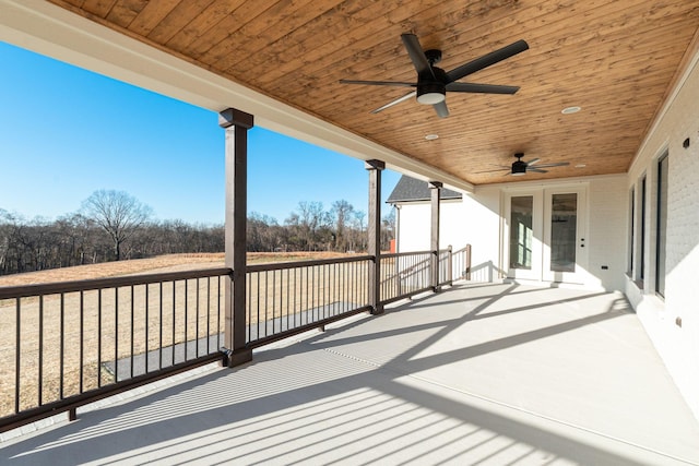 wooden deck with ceiling fan