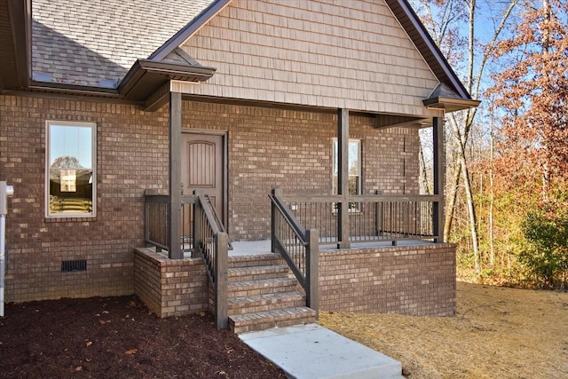 entrance to property with covered porch