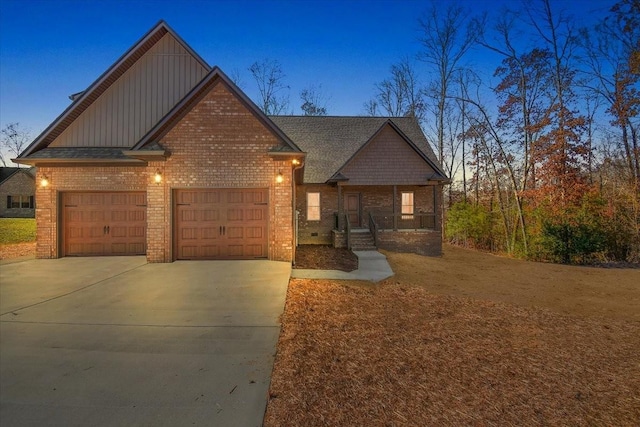 craftsman house with a garage