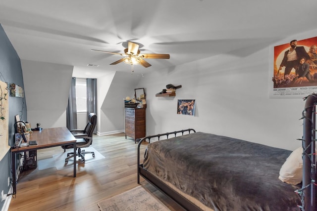 bedroom with light hardwood / wood-style floors and ceiling fan