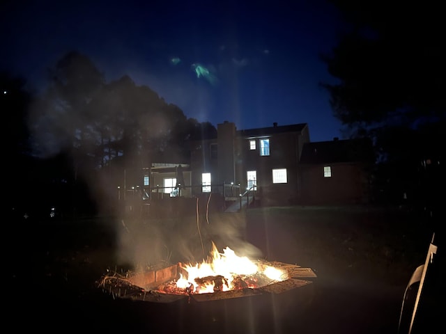 exterior space with a fire pit