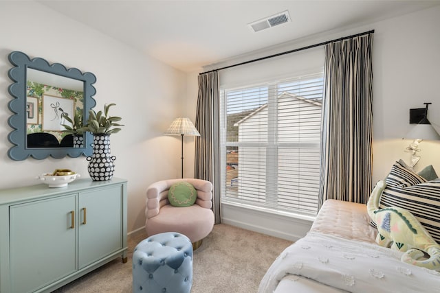 sitting room with light colored carpet