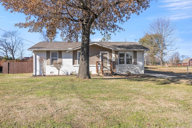 view of front of home with a front lawn