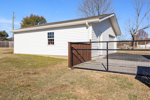 view of home's exterior with a yard