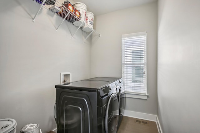 laundry room featuring washer and dryer