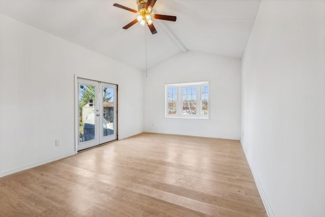 spare room with french doors, light hardwood / wood-style flooring, and a healthy amount of sunlight