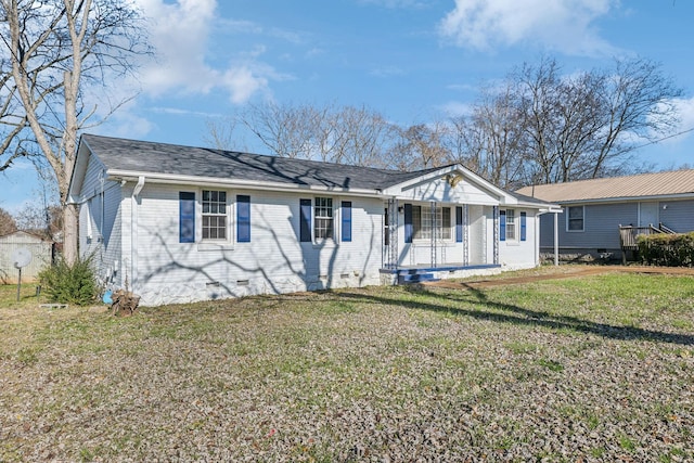 ranch-style house with a front lawn and covered porch