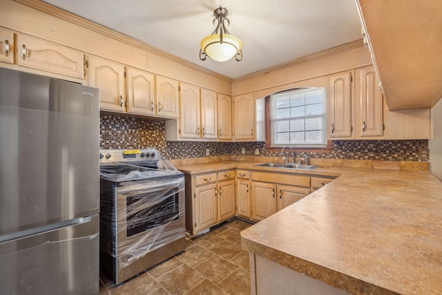 kitchen with decorative backsplash, crown molding, sink, and appliances with stainless steel finishes