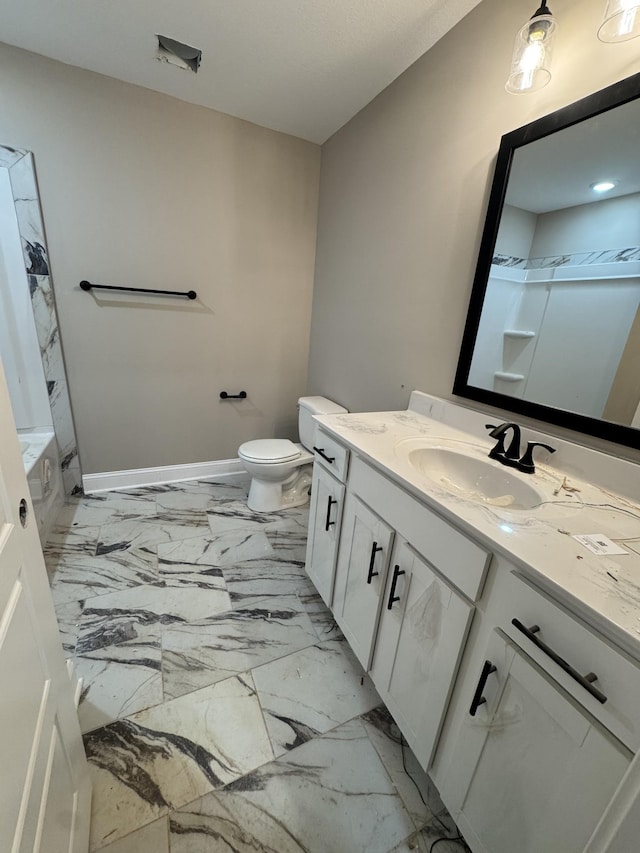 bathroom with marble finish floor, toilet, vanity, baseboards, and walk in shower