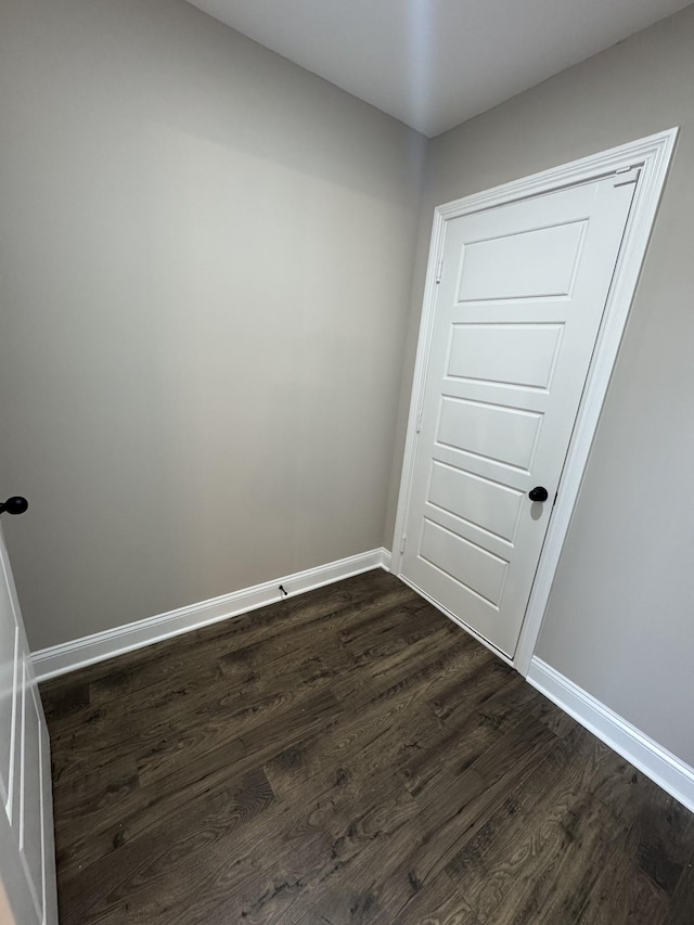 169 Anderson Pl, Clarksville, TN 37040 - empty room featuring baseboards and dark wood-style floors