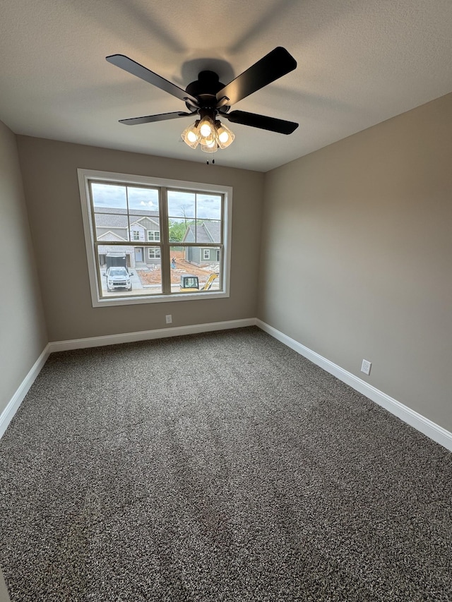 169 Anderson Pl, Clarksville, TN 37040 - empty room featuring a ceiling fan, baseboards, carpet floors, and a textured ceiling