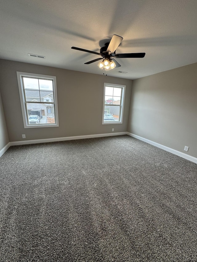 169 Anderson Pl, Clarksville, TN 37040 - carpeted spare room with a textured ceiling, visible vents, baseboards, and ceiling fan