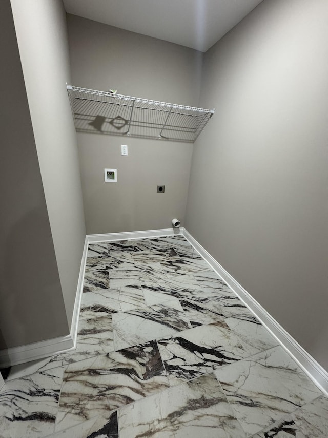 169 Anderson Pl, Clarksville, TN 37040 - laundry room featuring baseboards and marble finish floor