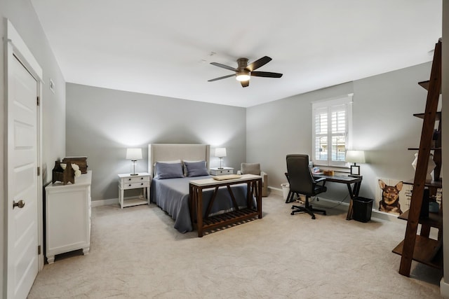 bedroom featuring ceiling fan and light colored carpet