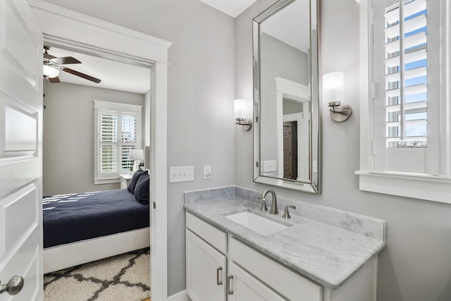 bathroom featuring ceiling fan and vanity