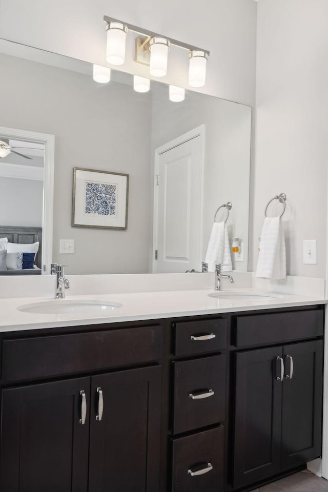 bathroom featuring vanity and ceiling fan