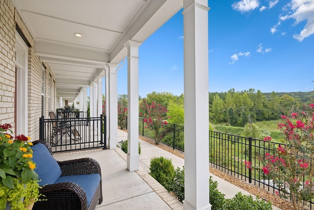 balcony featuring covered porch