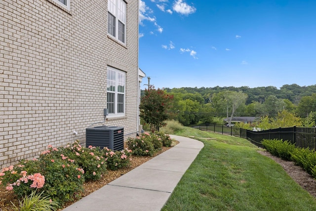 view of yard featuring central AC