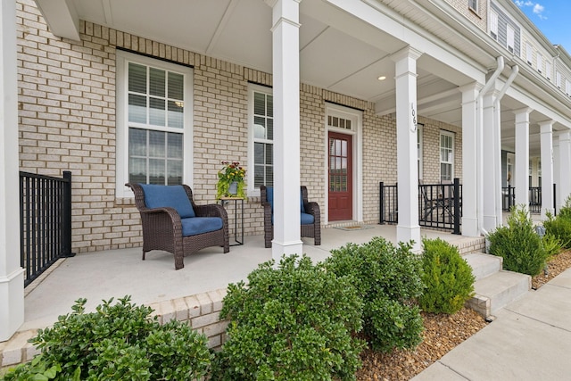 doorway to property featuring a porch