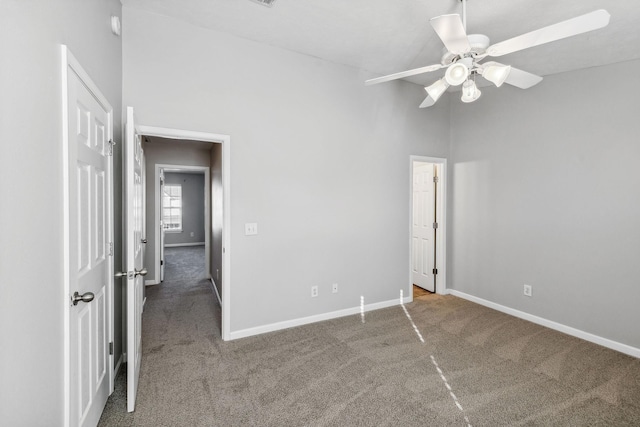 unfurnished bedroom featuring carpet floors and ceiling fan