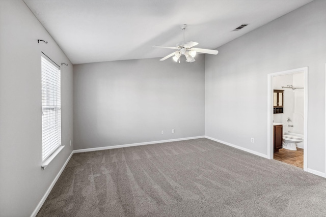 spare room with carpet flooring and ceiling fan