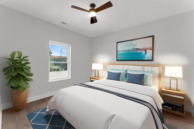 bedroom featuring ceiling fan and light wood-type flooring