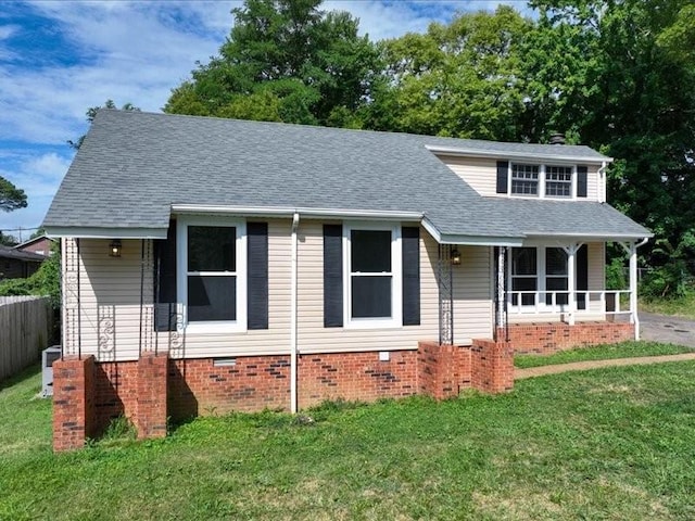 view of front of house with a front lawn and a porch