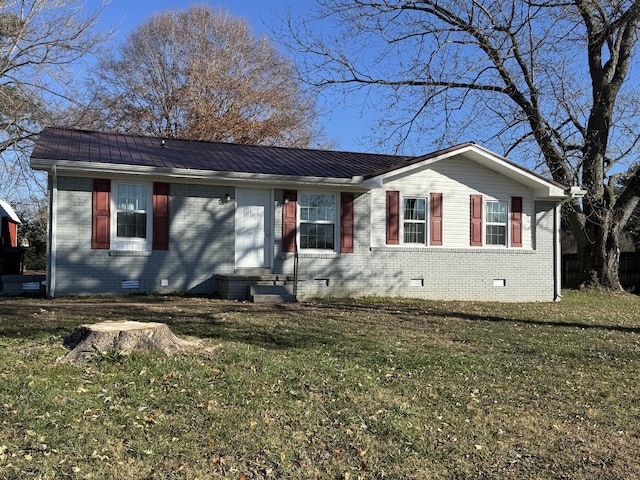 single story home with a front yard