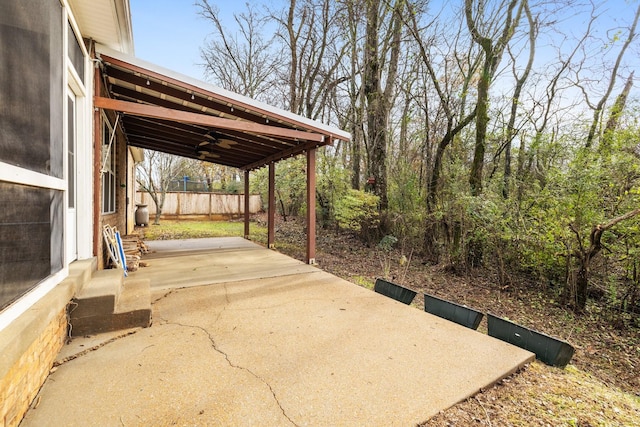 view of patio featuring ceiling fan