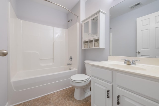 full bathroom featuring vanity,  shower combination, toilet, and tile patterned flooring