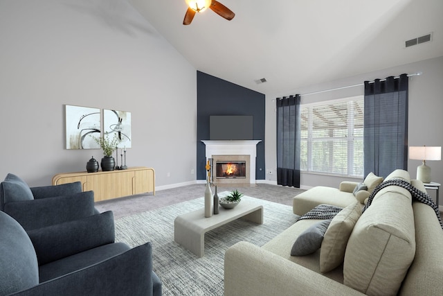 living room with carpet flooring, ceiling fan, and high vaulted ceiling