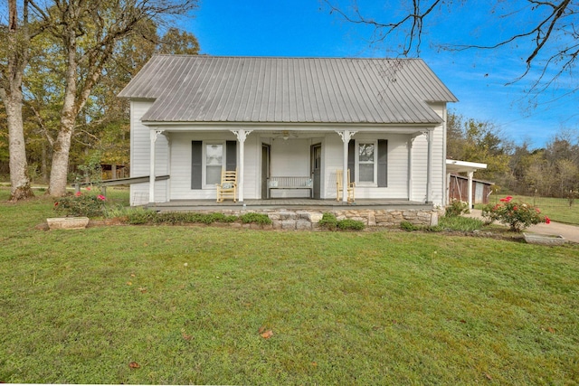 view of front of home featuring a porch and a front yard