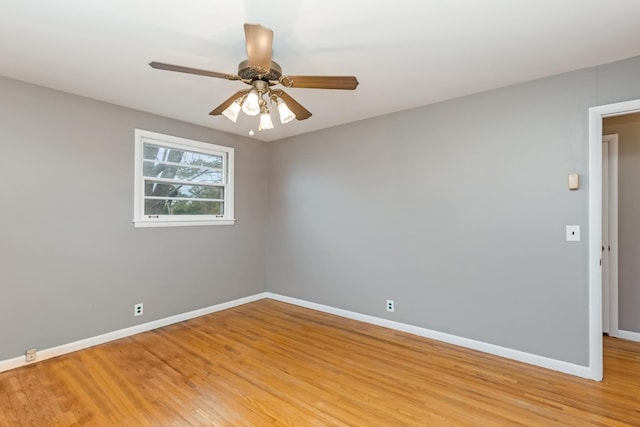 spare room with light hardwood / wood-style floors and ceiling fan