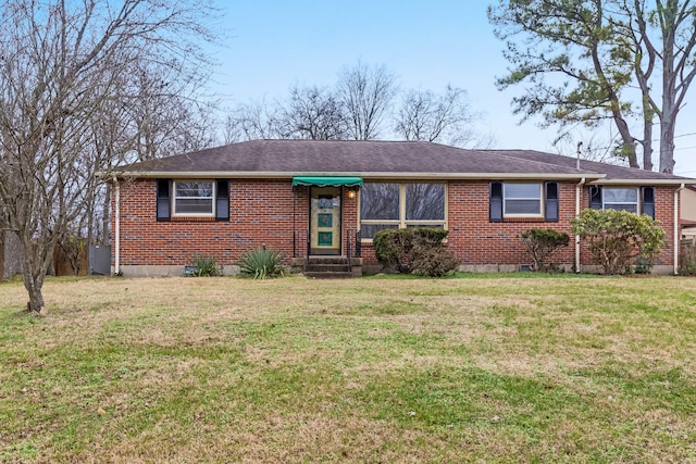 ranch-style house with a front lawn