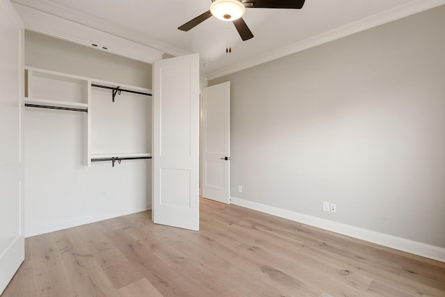 unfurnished bedroom featuring ceiling fan, a closet, ornamental molding, and light hardwood / wood-style flooring