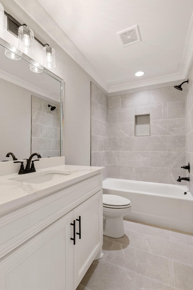 full bathroom with tiled shower / bath combo, tile patterned flooring, toilet, vanity, and ornamental molding