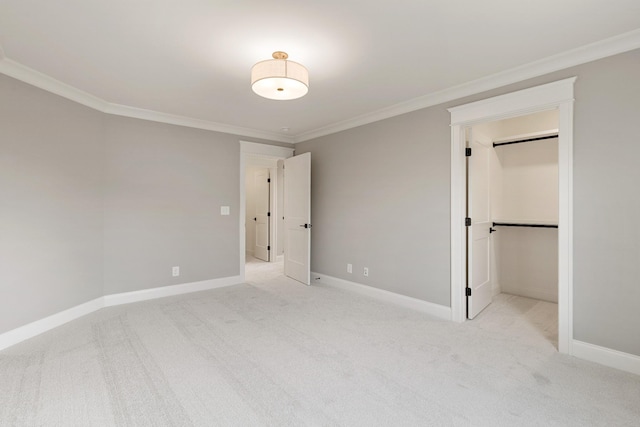 unfurnished bedroom featuring light colored carpet, a closet, and ornamental molding