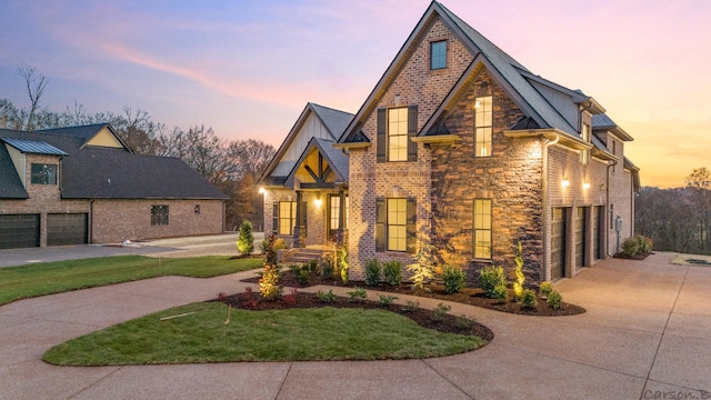 tudor-style house with a garage