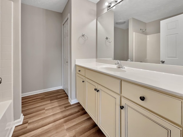 2002 Arum Ct, Spring Hill, TN 37174 - bathroom with vanity, shower / tub combination, and wood finished floors