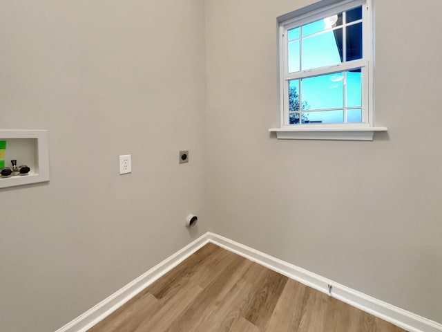 2002 Arum Ct, Spring Hill, TN 37174 - laundry room with hookup for an electric dryer, wood finished floors, and hookup for a washing machine
