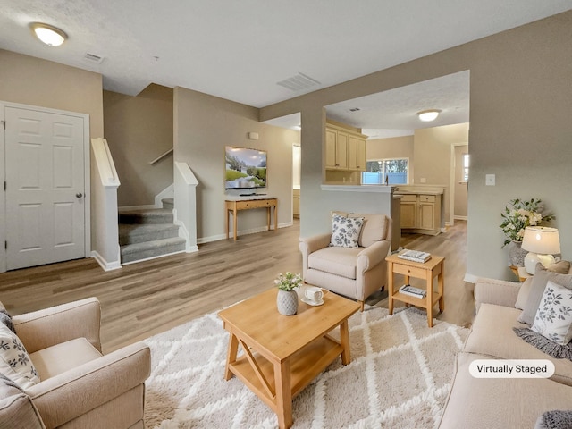 2002 Arum Ct, Spring Hill, TN 37174 - living room with light wood-style flooring and stairs