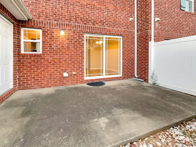 2002 Arum Ct, Spring Hill, TN 37174 - entrance to property featuring brick siding and a patio