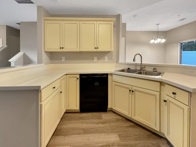 2002 Arum Ct, Spring Hill, TN 37174 - kitchen with a peninsula, dishwasher, cream cabinets, and a chandelier