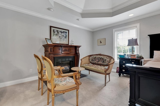 sitting room featuring light carpet and crown molding